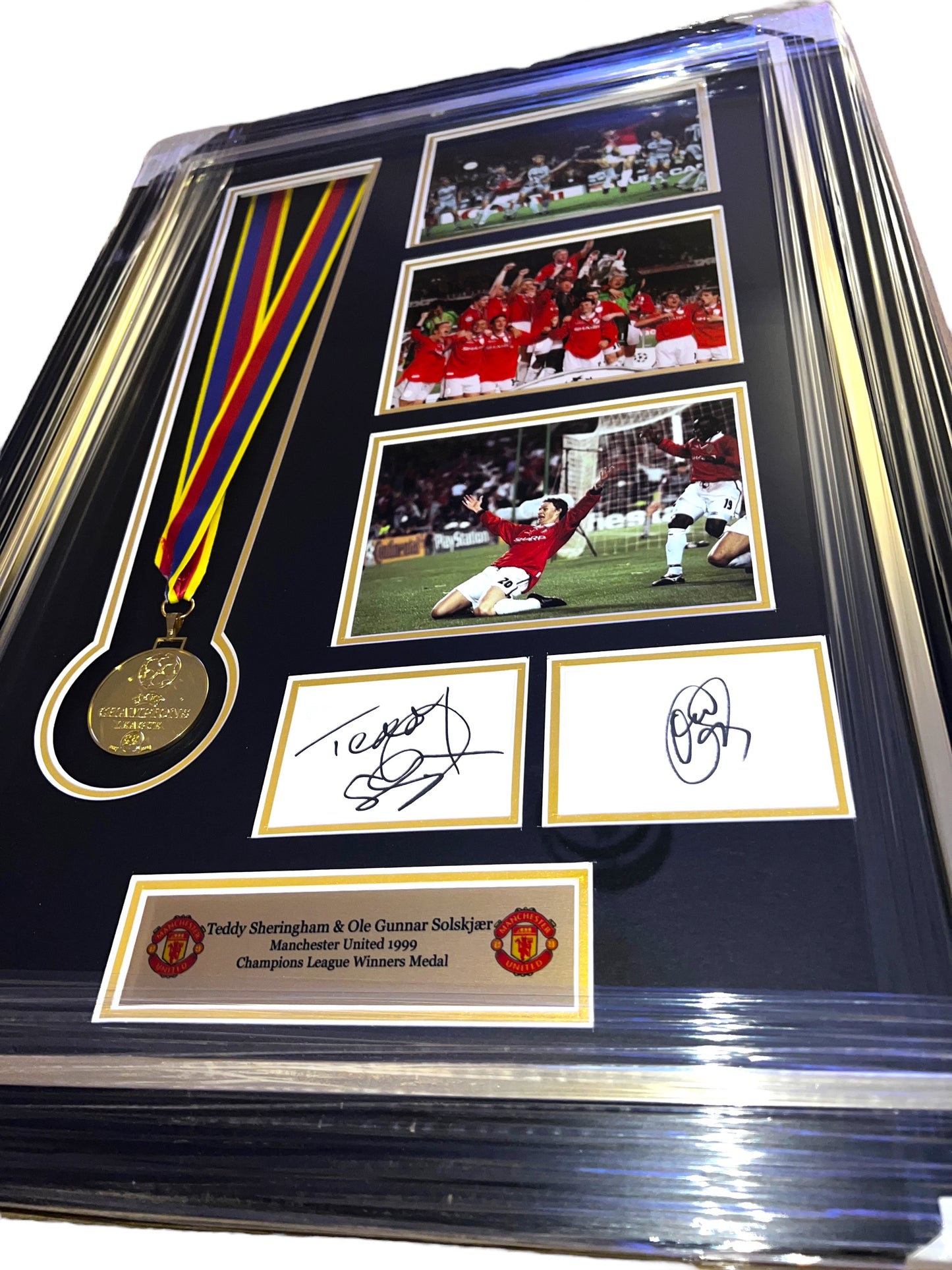 Manchester United 1999 Champions League Replica Medal signed by Teddy Sheringham and Ole Gunnar Solskjaer